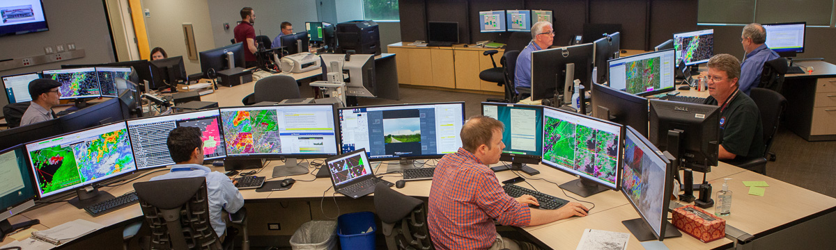 Forecast meteorologists at work in the Norman, OK Weather Service Forecast Office