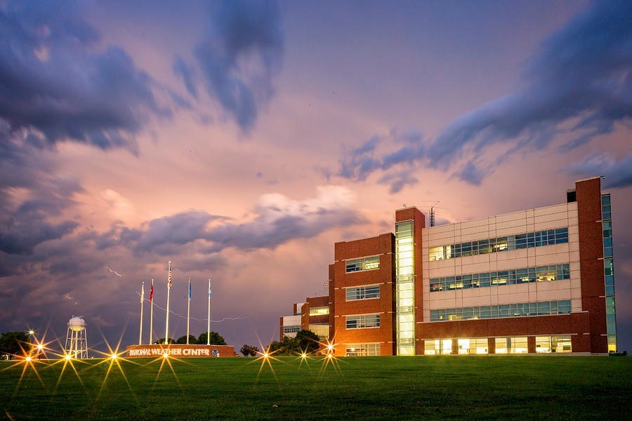 The National Weather Center at dusk as storm clouds begin to roll in overhead. National Weather Center. NOAA.