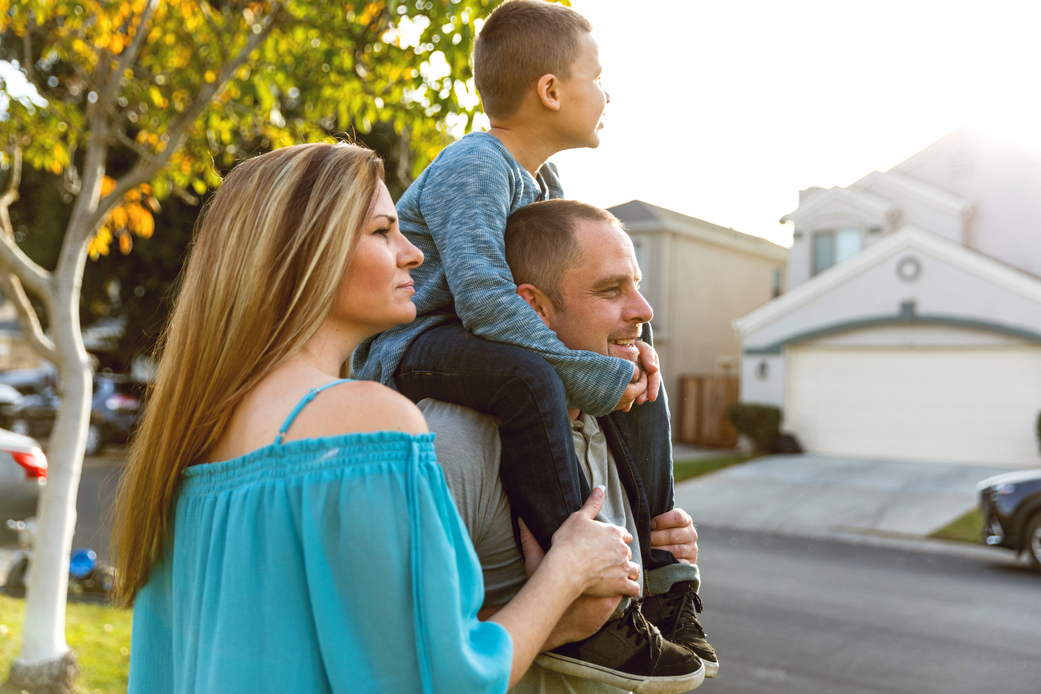 Family in front of House