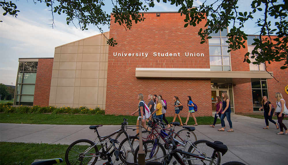 students walk by the University Student Union