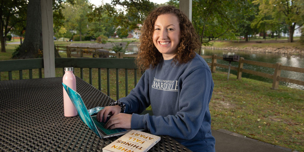 A students at SIUE using a computer.