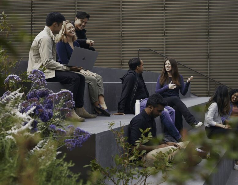 group of people meeting on stairs