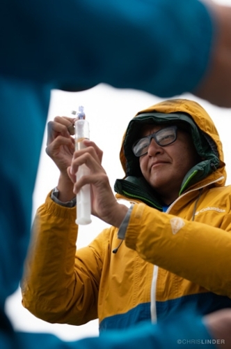 Woman in yellow raincoat