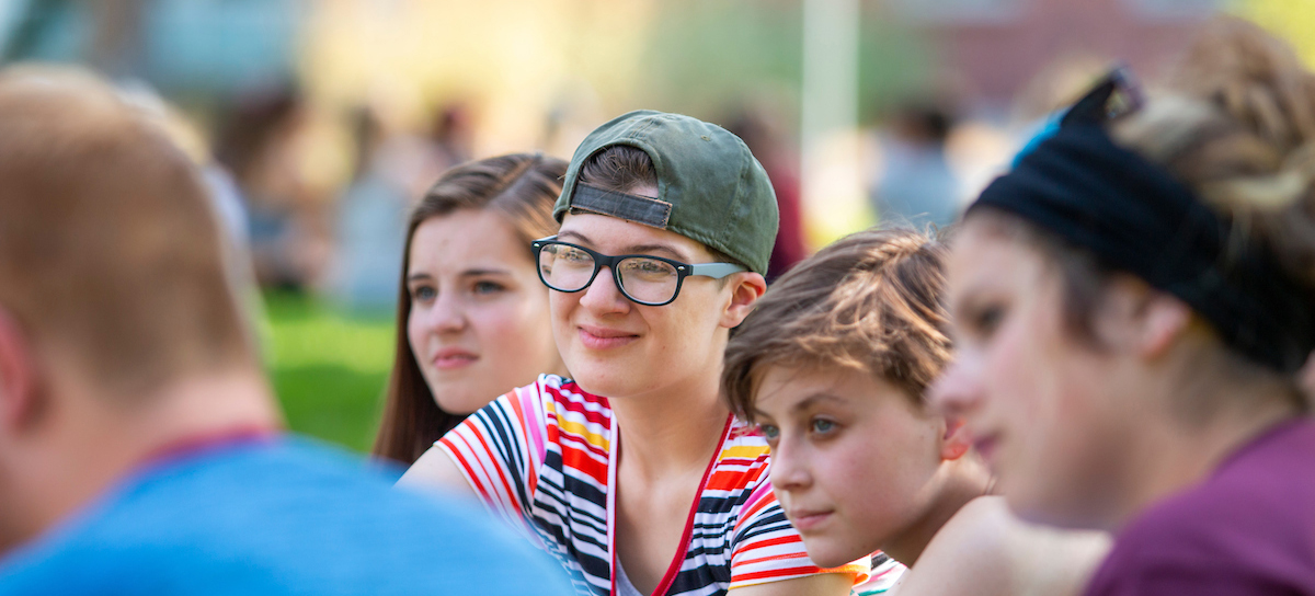 UM students sit in a group during Orientation