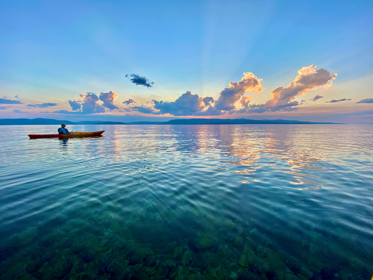 Photo of a kayaker on Flathead lake