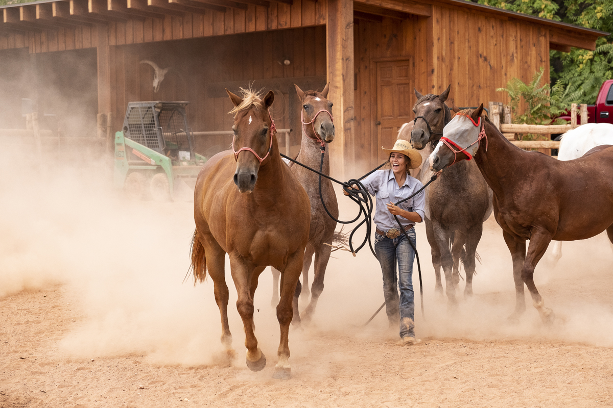 A photo of Ashtyn Carlson with her horses.