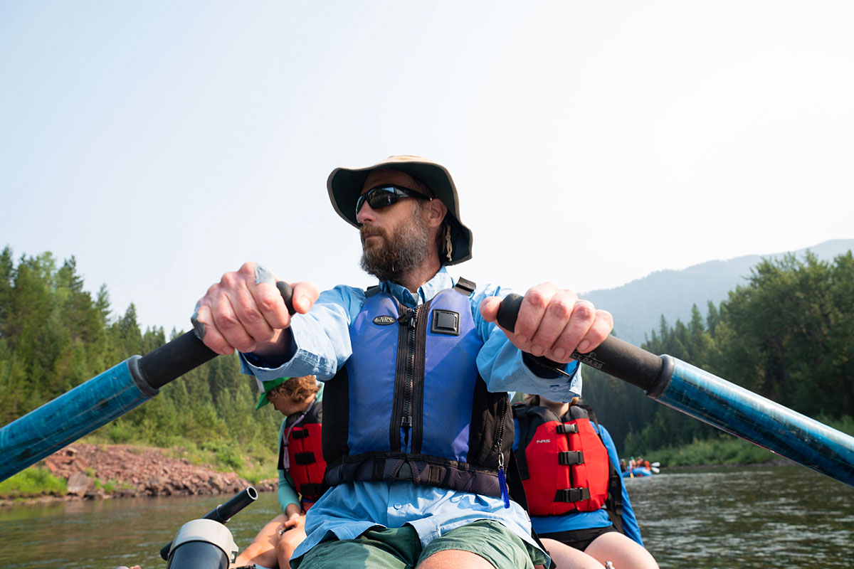 A picture of researcher Bob Hall rowing in a raft.