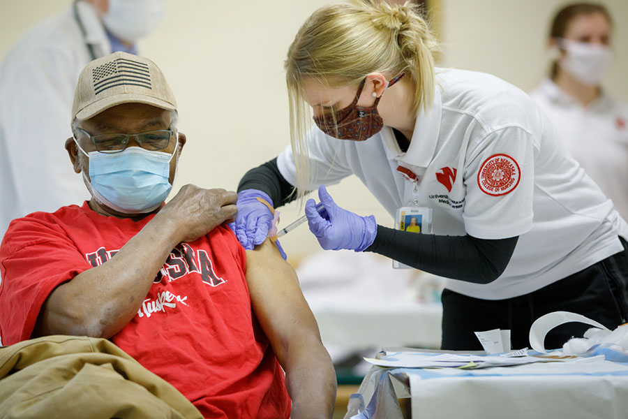 UNMC nursing students help in a community vaccine clinic