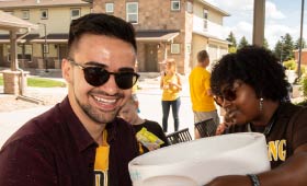 Students move in to a campus apartment.