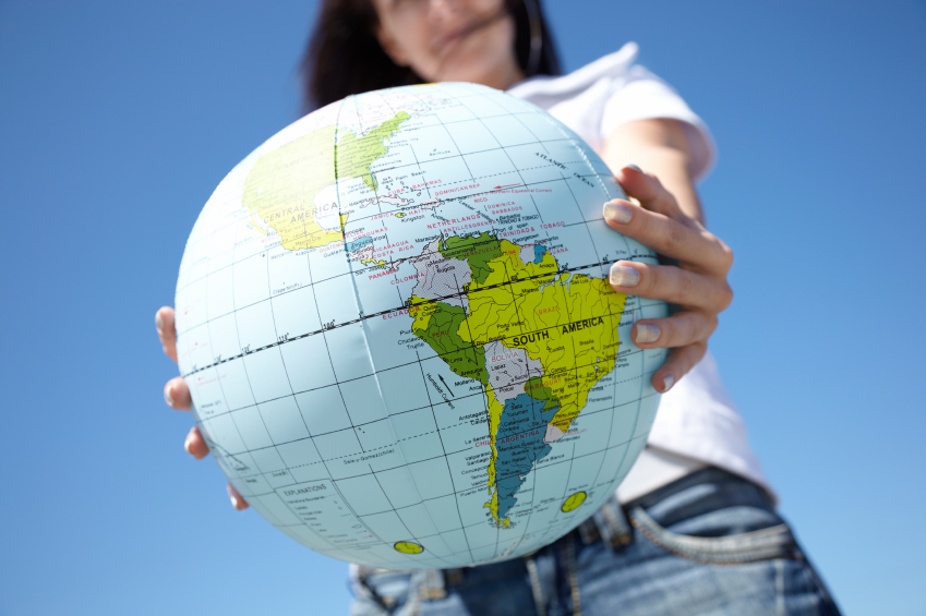 Girl holding a globe