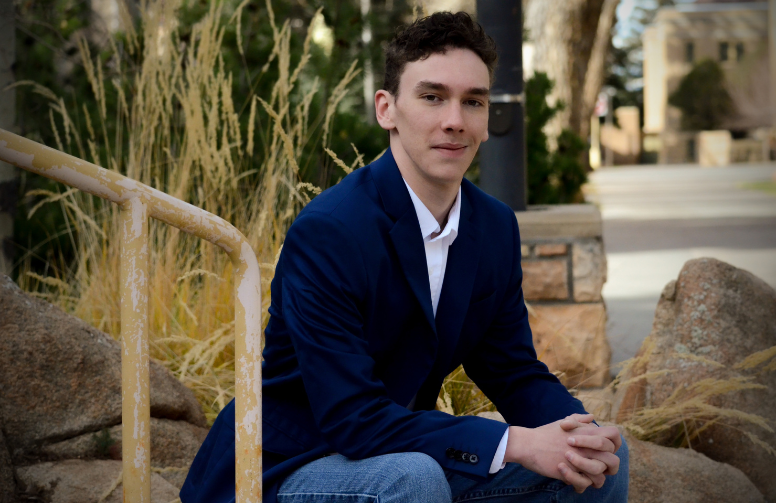 A student in a suit jacket