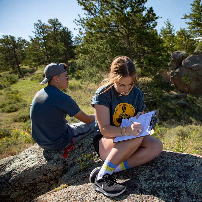 Two students out in the field