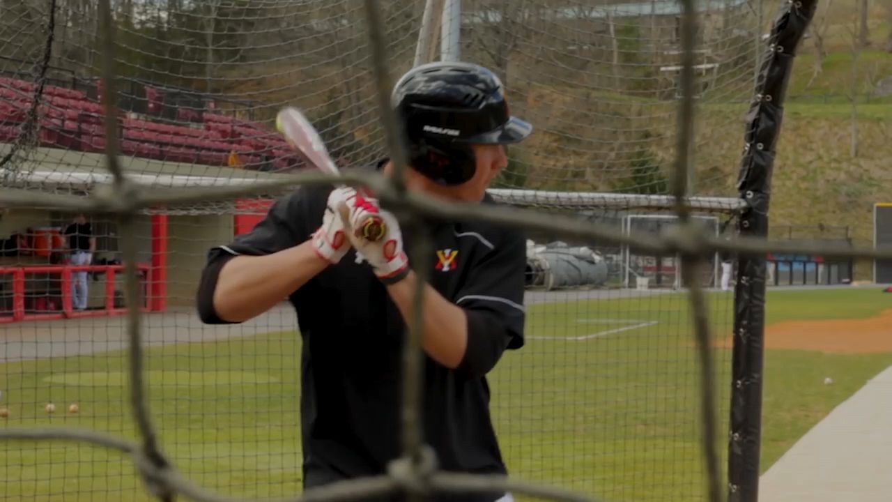 baseball player swinging a bat