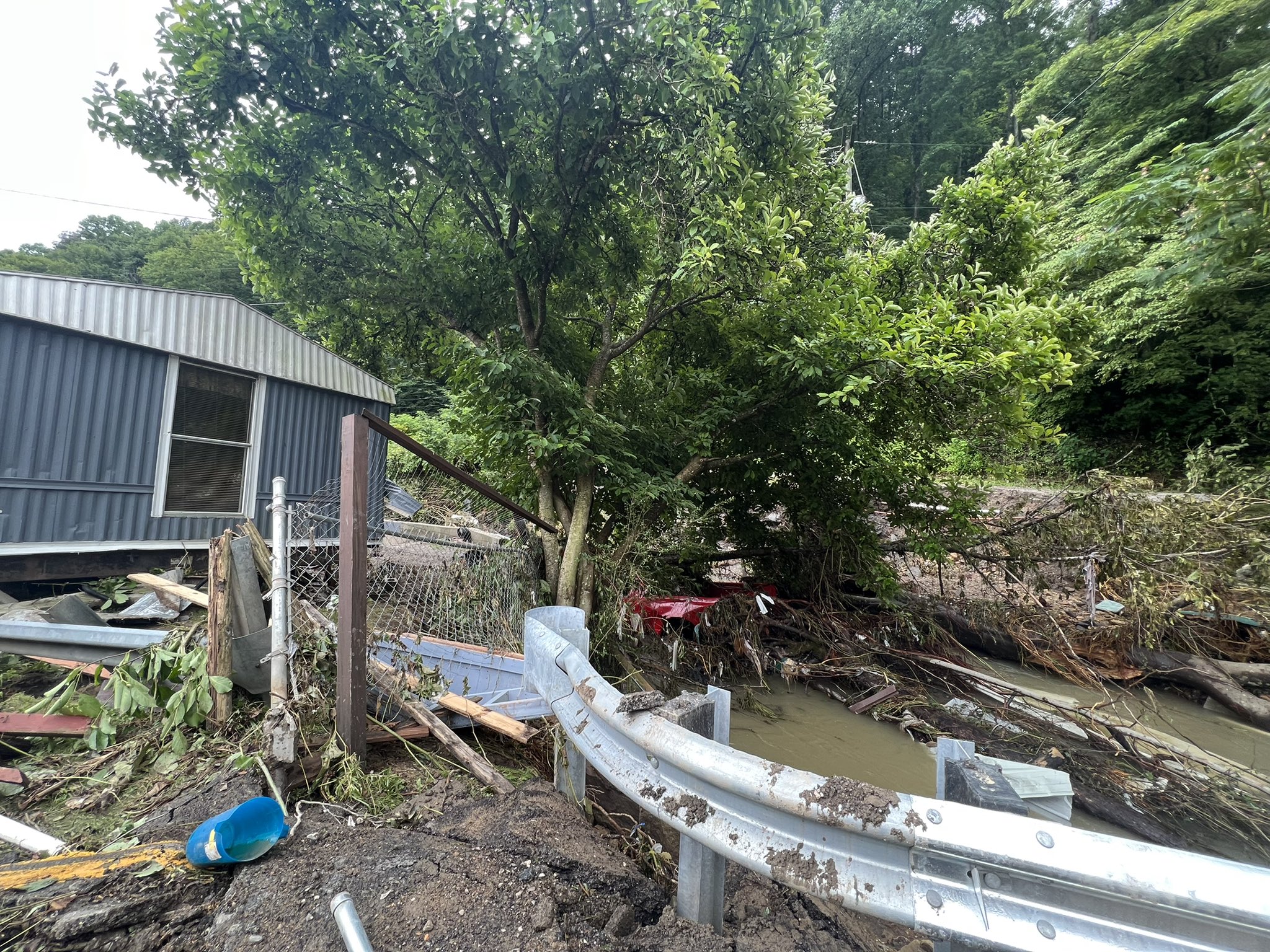 A house was damaged by flash floodingÂ in Bulan, KY