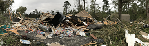 The remnants of the Munsonâ€™s mobile home (Photo- Charlie Woodrum)