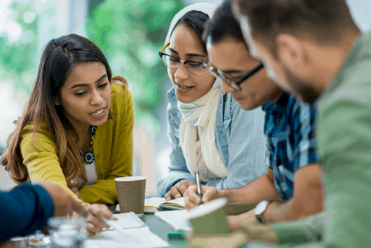 Professionals working together at a table