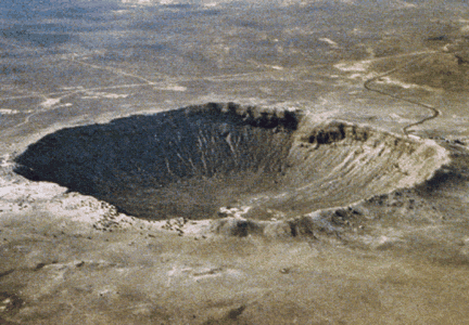 This is the Barringer Meteor Crater in Arizona. The diameter is 1.2
  kilomters, and it is 49,000 years old. Compared with other planets, <a
  href="/earth/Interior_Structure/crater.html&dev=">impact
  craters</a> are rare <a
  href="/earth/Interior_Structure/surface_features.html&dev=">surface
  features</a> on Earth. There are two main reasons for the low number of
  craters. One is that our <a
  href="/earth/Atmosphere/overview.html&dev=">atmosphere</a>
  burns up most <a
  href="/our_solar_system/meteors/meteors.html&dev=">meteoroids</a>
  before they reach the surface. The other reason is that Earth's surface is <a
  href="/earth/interior/plate_tectonics.html&dev=">continually
  active</a> and erases the marks of craters over time.<p><small><em>D. Roddy and LPI</em></small></p>