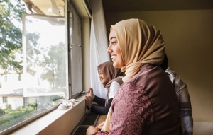 sisters-looking-out-window-small.jpg